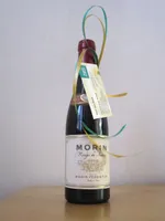 De fles wijn, cadeautje van Super de Boer Van Dam